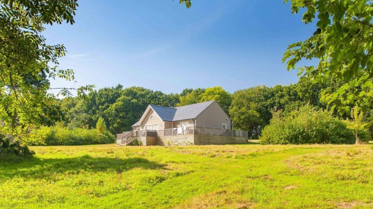 Pattiswick Cabin | A delightful lodge with hot tub on Wakes Hall Farm is a haven of peace in 500 acres of private land