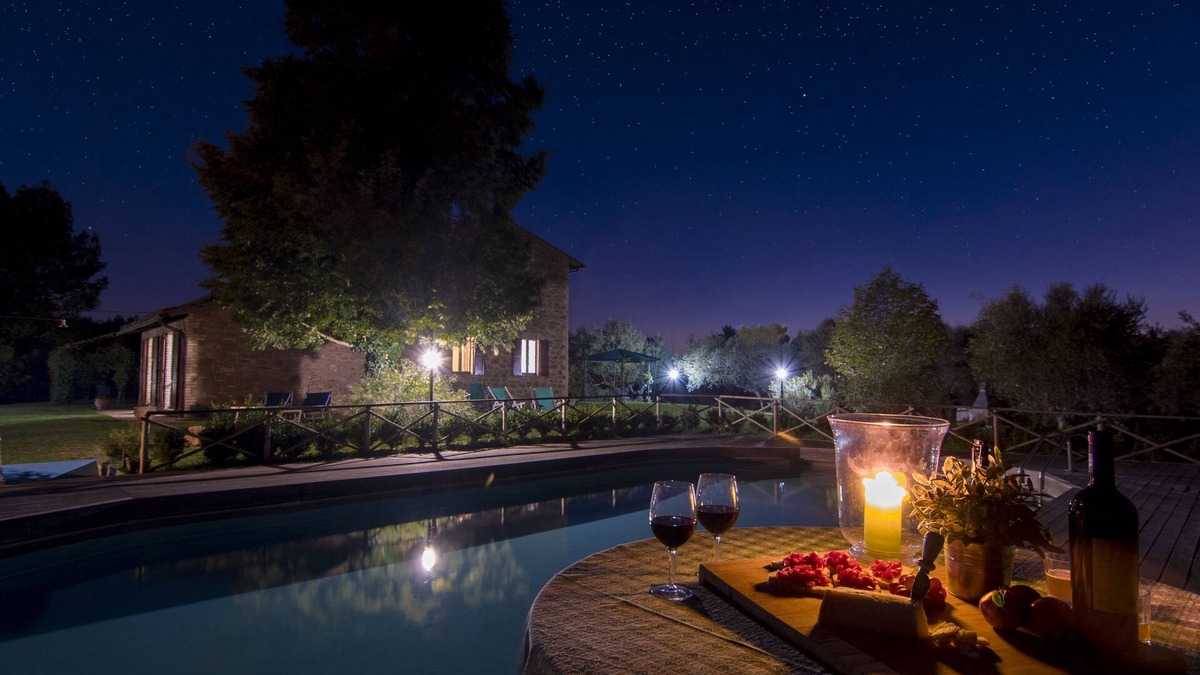 Torgiano Villa | A farmhouse nestled among gardens and olive trees
