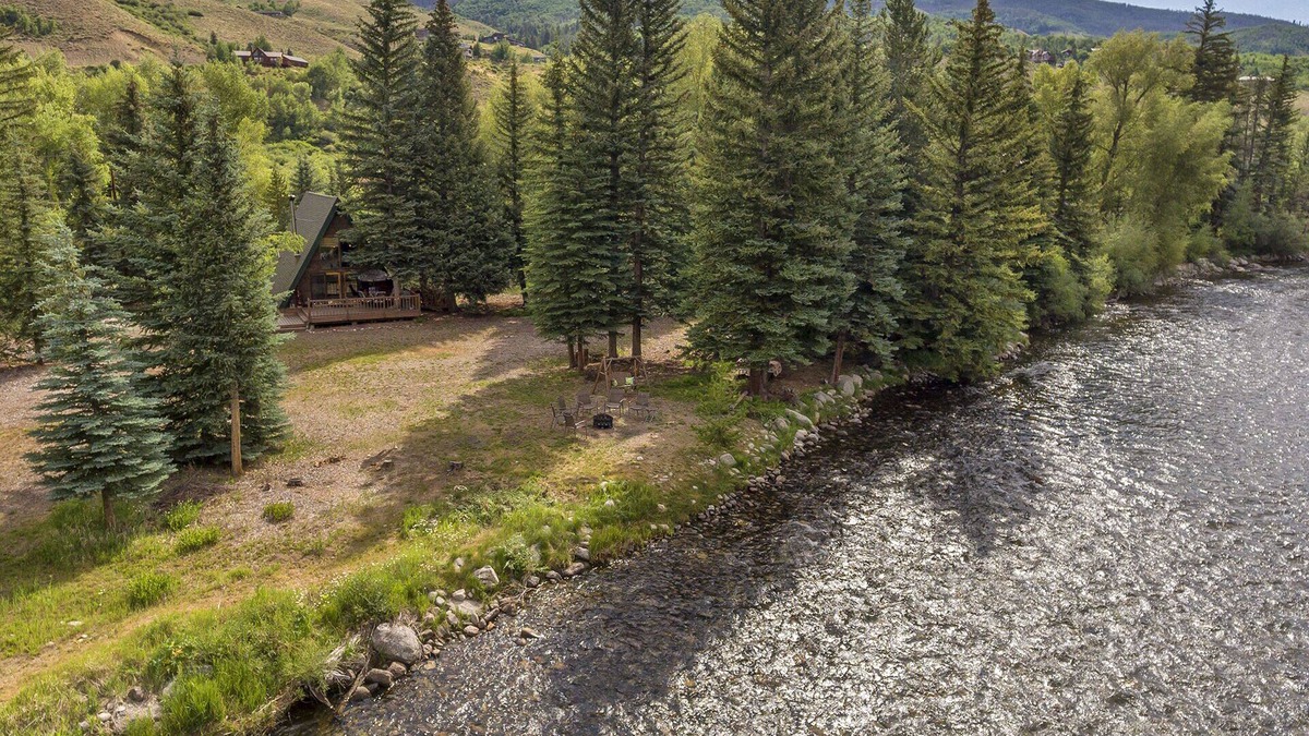 South Forty Cabin | A-Frame Cabin On The Blue River, Big Deck, Fishing, Easy Drive to Town