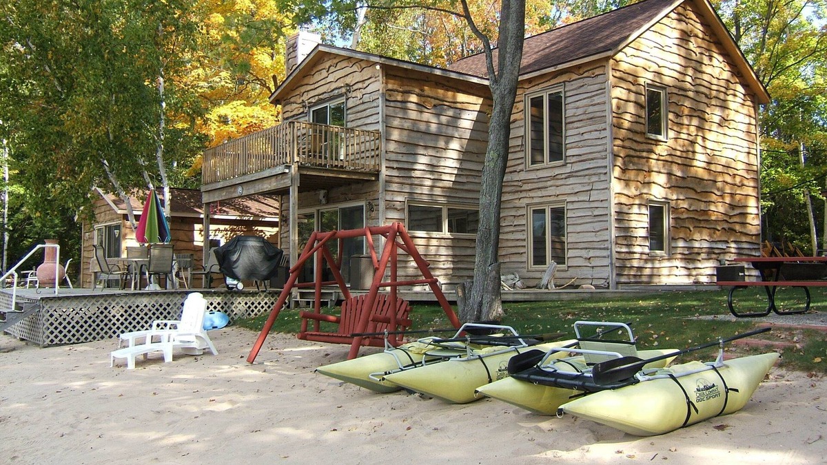 Traverse City Cottage | A Lakeside Delight w/PRIVATE Beach & Dogs Welcome