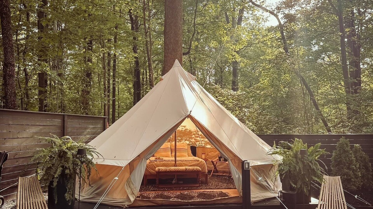 Denver House | A luxurious glamping tent nestled in the trees.