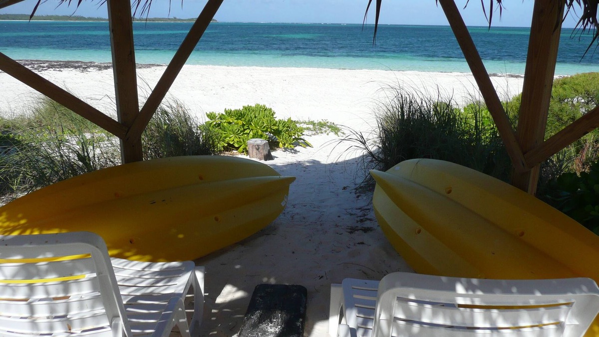 Winding Bay Villa | A luxury beachfront villa, surrounded by palms, with superb views of Winding Bay