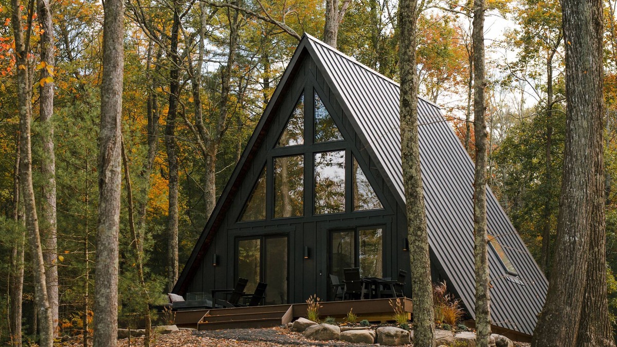Town of Lumberland Cabin | A modern A-frame, nestled in the woods with relaxing outdoor spaces and firepit.