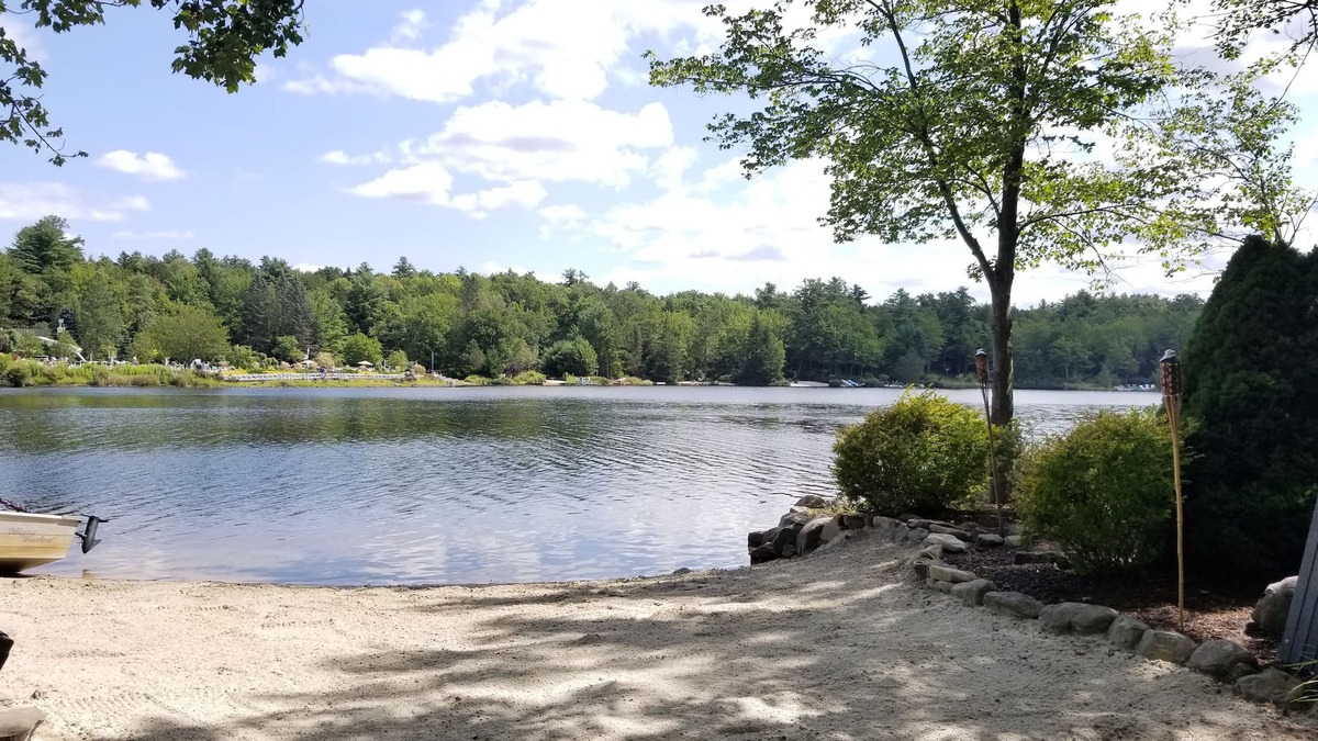 Pocono Pines House | A quaint wooded lakefront home with private beach!