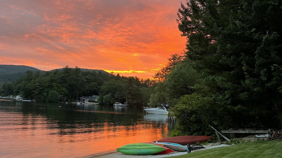 Alton Bay House | A quiet cove, the sunset and a sandy beach, on Lake Winnipesaukee