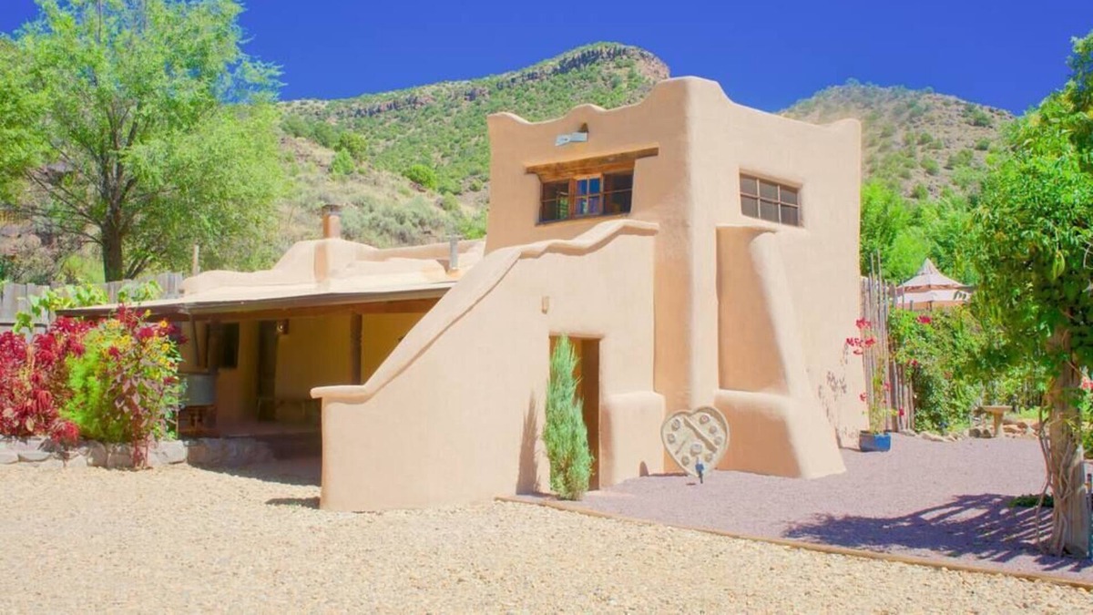 Pilar House | A romantic adobe, river retreat with outdoor tubs.
