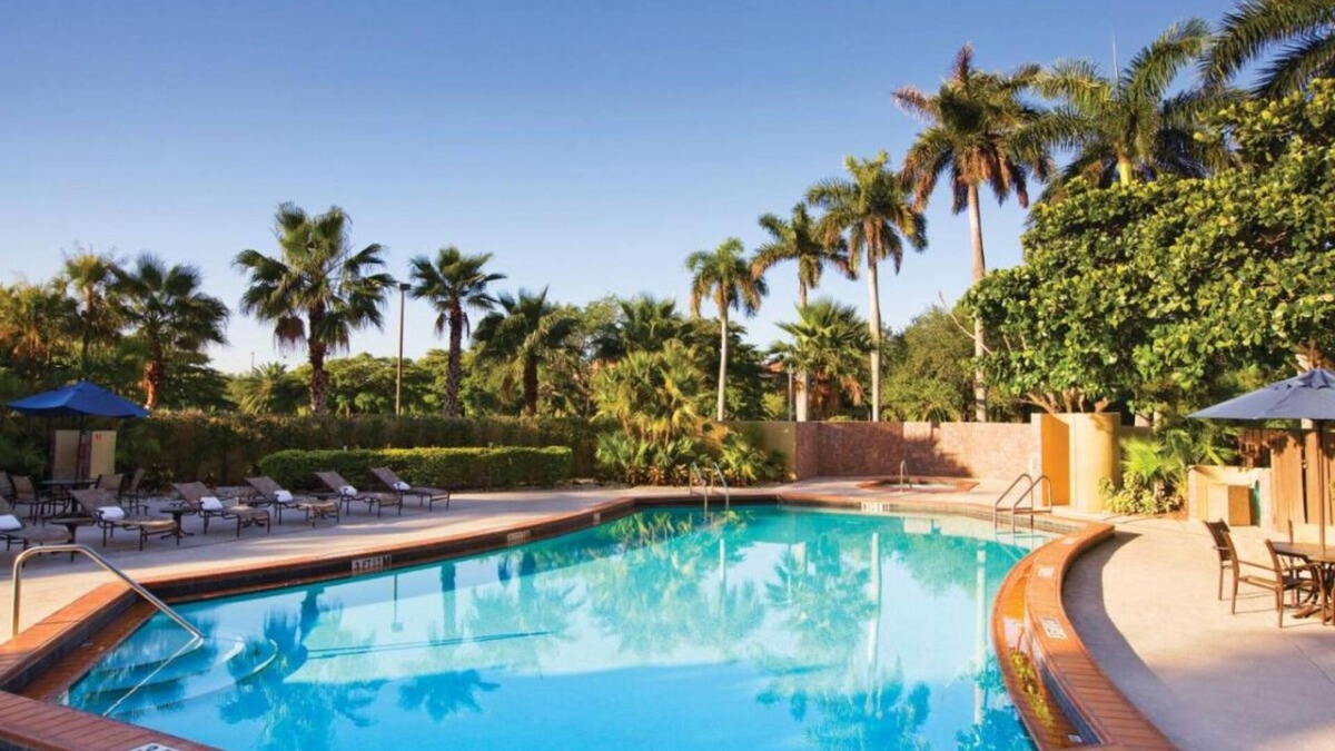 Ludlam Hotel | A short drive away from Phillips Park! 2 Contemporary Units! Pool, Pets Allowed!