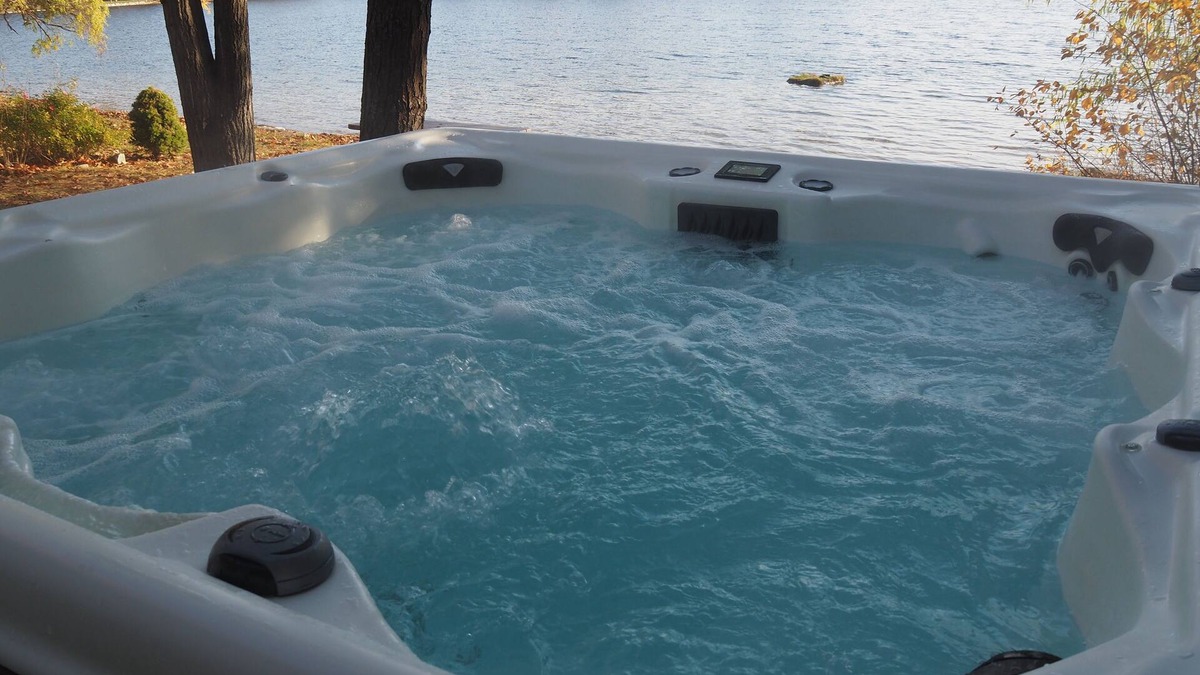 Elk Rapids Cottage | A Short's Walk - Sandy Lakefront with Spa/Hot Tub and Kayaks!