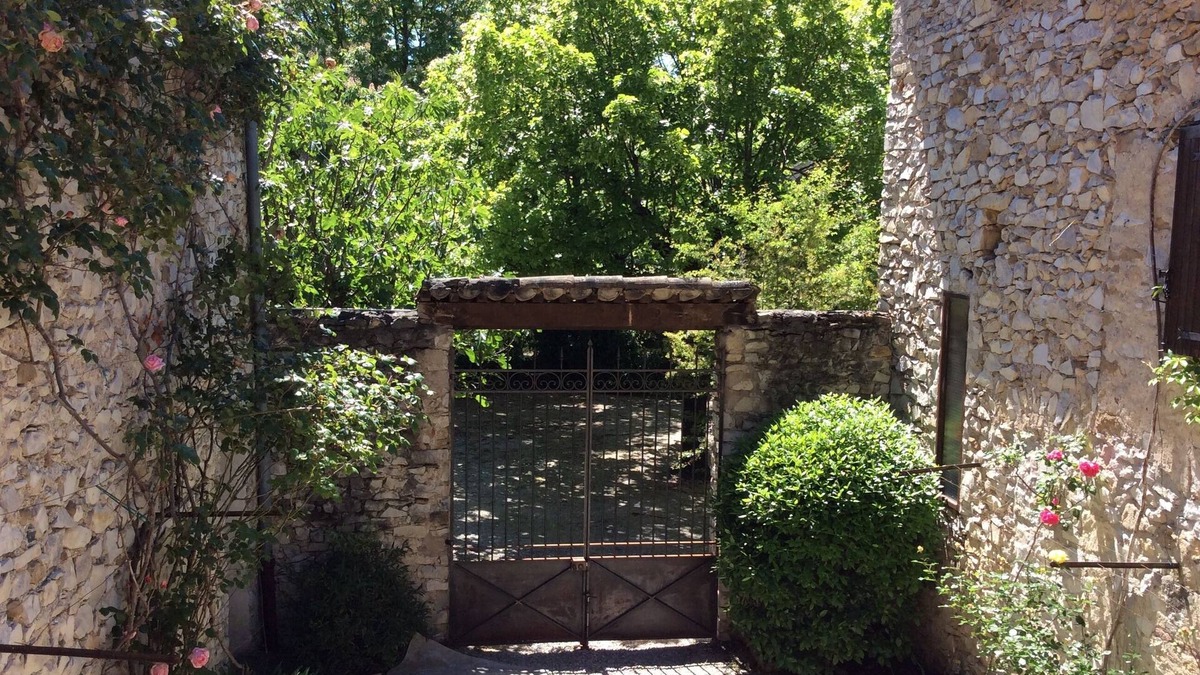 Vaison-la-Romaine House | A Stone Farmhouse With a Courtyard And a Vineyard In a First-Century Roman Town
