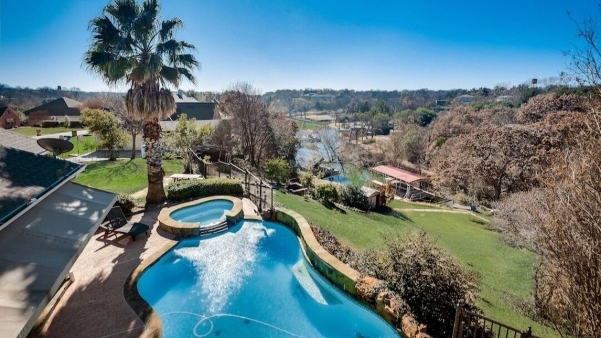 Fort Worth House | A summer boat dock & a pool