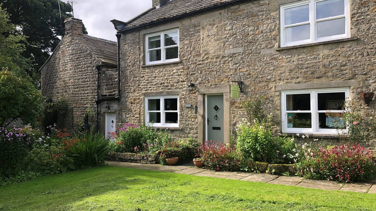 Romaldkirk Cottage | A Traditional Dales Cottage with log burning stove in the village of Romaldkirk.