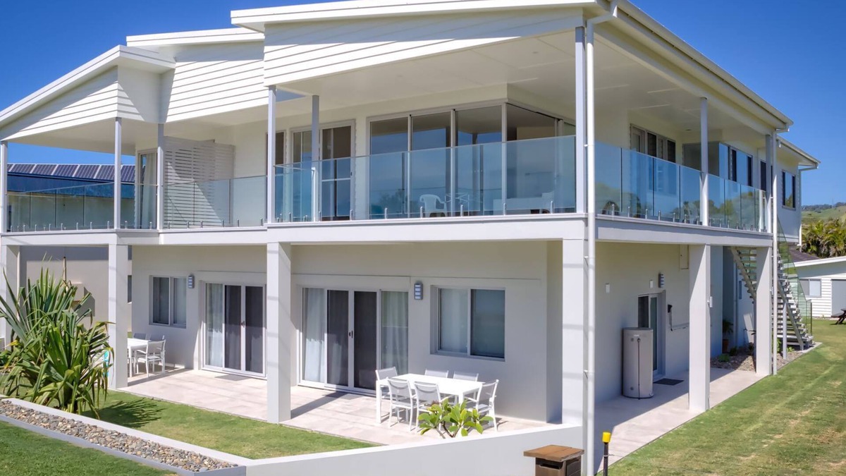 Woolgoolga Apartment | Absolute beachfront location, king size bed to relax and recover.Lock up garage
