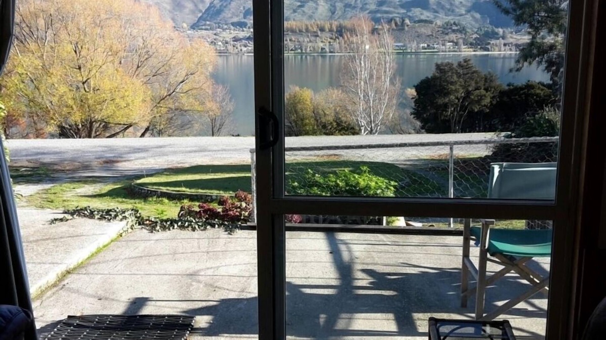 Wanaka House | Absolute Lakefront quirky sixties Unit, spectacular lake and mountain views.
