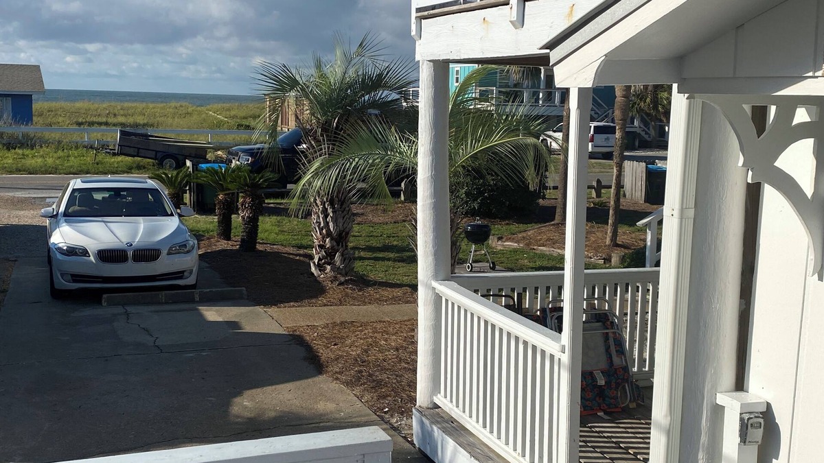 East End Condo | Adorable Beach Cottage. Full size swimming pool shared by four units in building