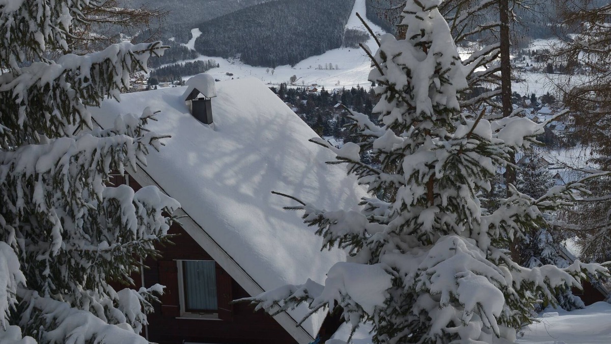 Les Lolettes Ski Chalet | Adorable chalet perched in the forest with breathtaking views of the ski area.
