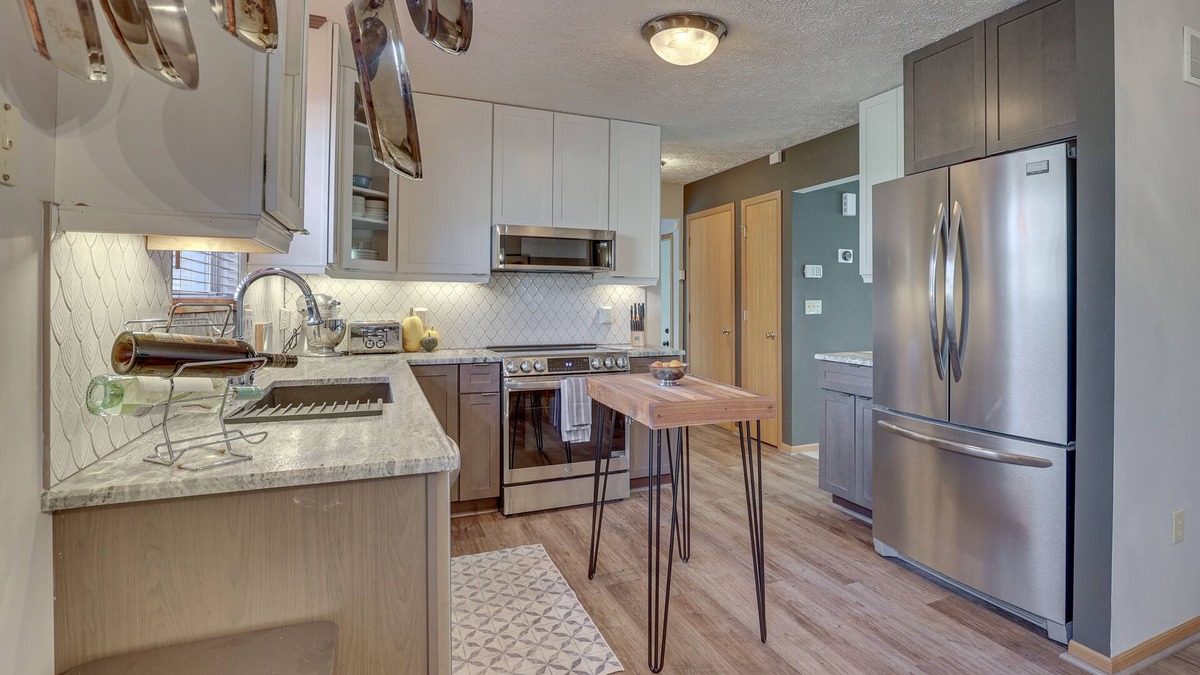 Highland Square Cottage | Akron Home w/Deck: Walk to Towpath Trail!
