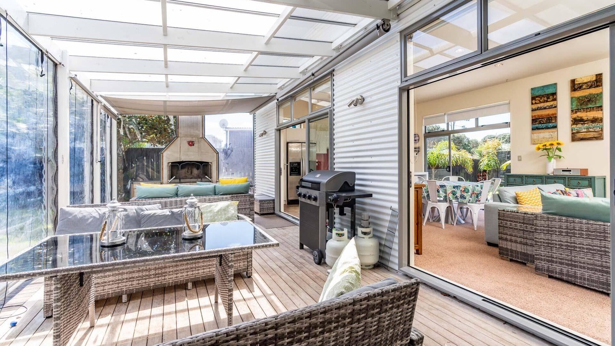 Mangawhai Heads House | All Decked Out - Modern holiday home with great covered outdoor entertaining space in handy location