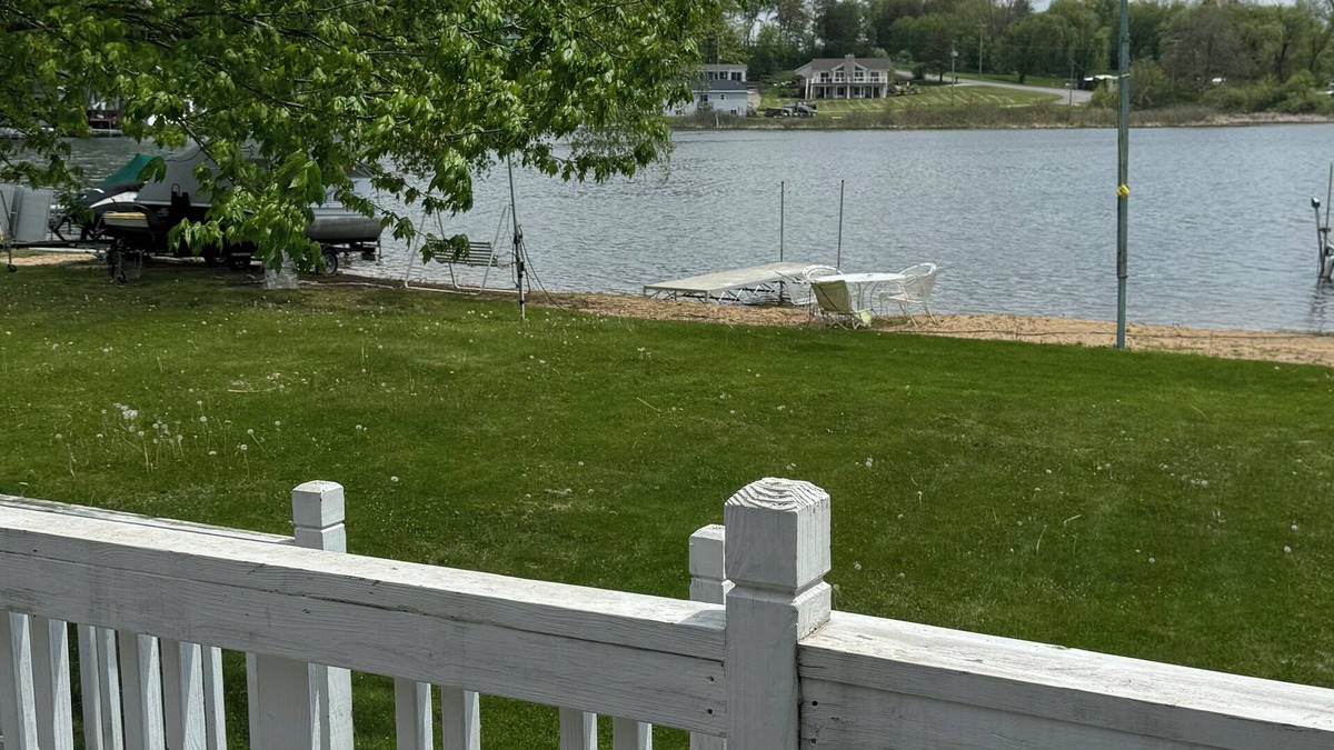 Smyrna Cottage | AllSports lakefront cottage. 3 bedrooms, 2 baths, private beach, yard and deck