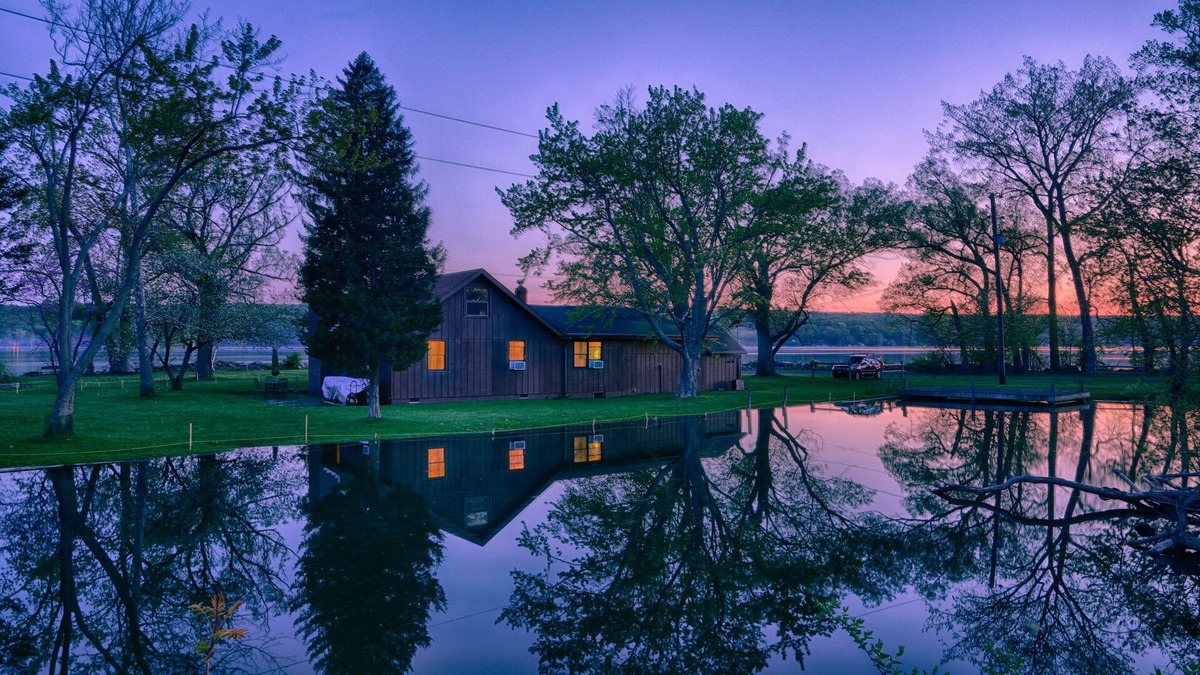 Lansing House | Almost an island in Cayuga Lake! Private & panoramic 650' of level lake frontage