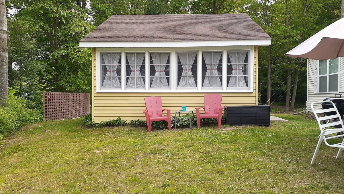 Broomfield Cabin | Amazing lakefront cabin with private beach, boat slip, kayaks, and pedal boat.