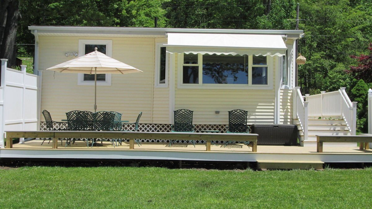 Lebanon House | Amston Lake waterfront home, aluminum boat with electric motor provided