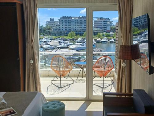 Nordelta Apartment | Apart , Departamento condominio en Bahia grande Nordelta con balcon y vista a la bahia
