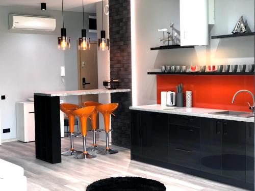 Wilkasy Apartment | APARTAMENT ELEGANCE ORANGE w Nautica Resort