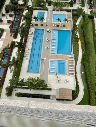 Camorim Apartment | Apartamento Barra da Tijuca Riocentro Ilha Pura Parque olímpico Rock in Rio 2024 piscina aquecida