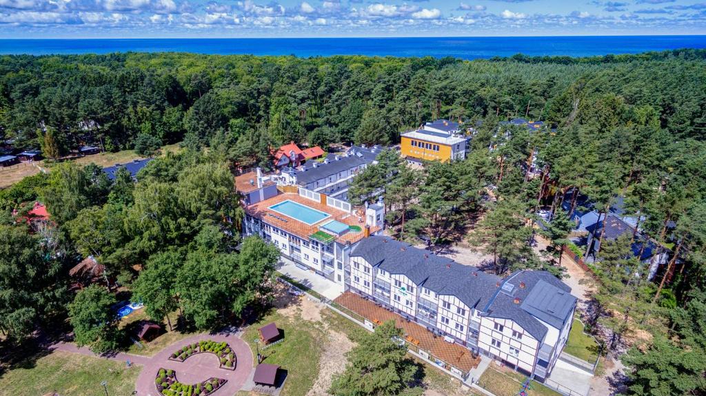 Poddabie Apartment | Apartamenty Poddąbek- basen kryty, sauna, animacje dla dzieci , małpi gaj, baseny na dachu