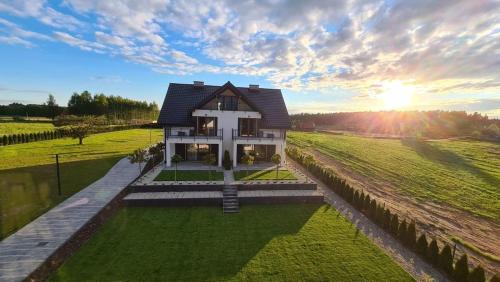 Faszcze Apartment | APARTAMENTY SKORUPKI-Mazury Mikołajki