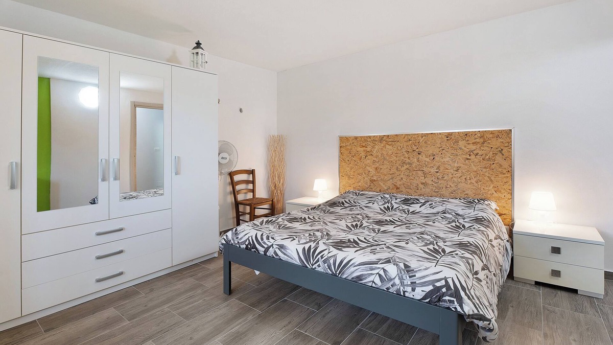 Arona Apartment | Apartment 'Bambù' with Private Garden, Balcony and Wi-Fi