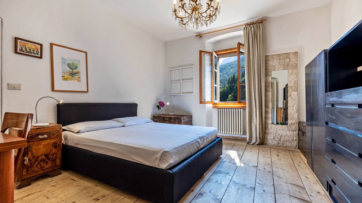 Sella Giudicarie Apartment | Apartment "Casa Nel Borgo Iris" with Mountain View and Shared Garden