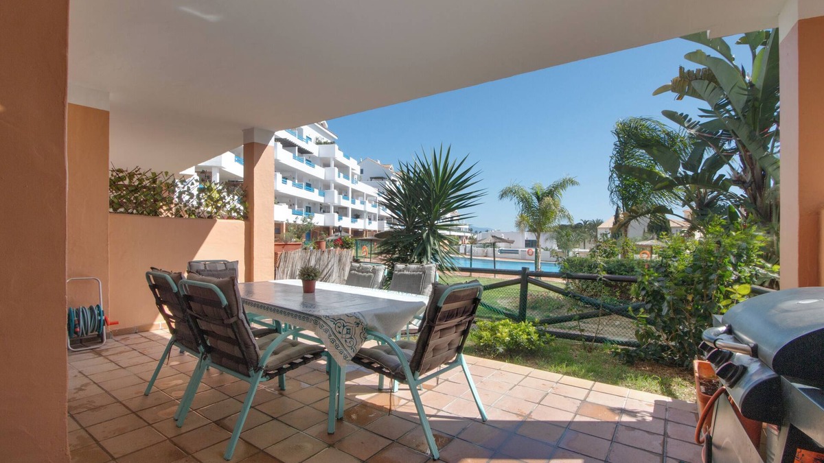 Castillo de Sabinillas Apartment | Apartment 'Duquesa Suites Golf and Gardens' with Shared Pool, Wi-Fi and Air Conditioning