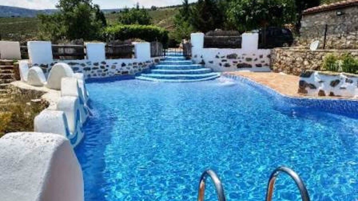La Torre d'En Besora Apartment | Apartment 'Cau' with Mountain View, Shared Pool and Private Terrace