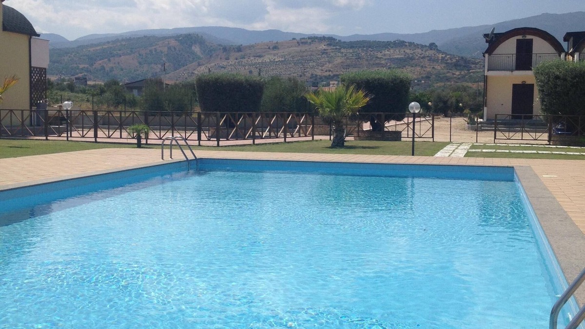 Isca Marina House | Apartment in Private Gated Complex with Pool and Mountain Views