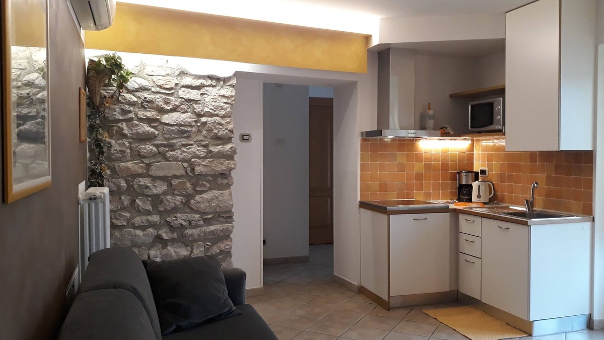 Cassone Apartment | Apartment in restored Rustico directly on the lake, open all year.
