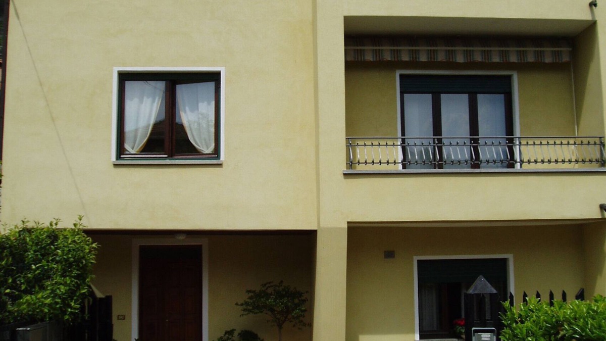Dongo Apartment | Apartment in semi-detached house with large garden near the lake