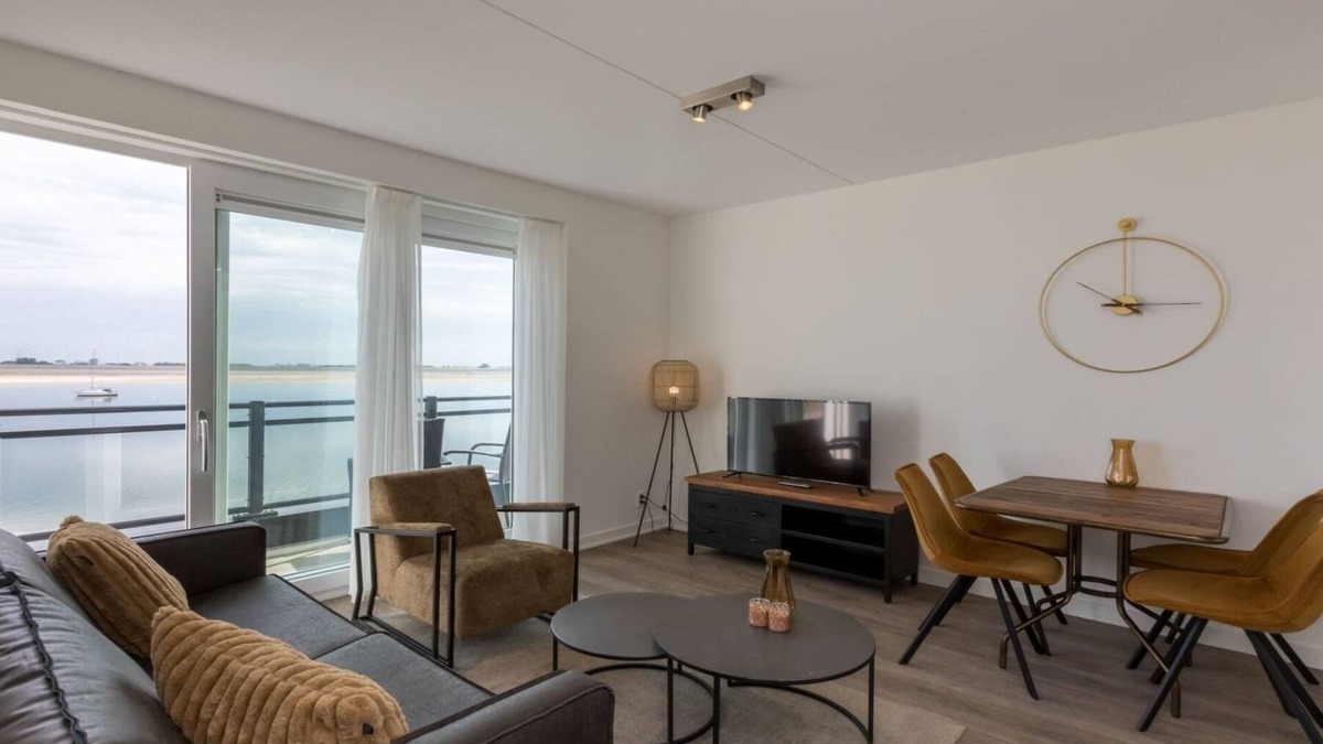 Sint-Annaland Apartment | Apartment in Sint-Annaland with Water Views