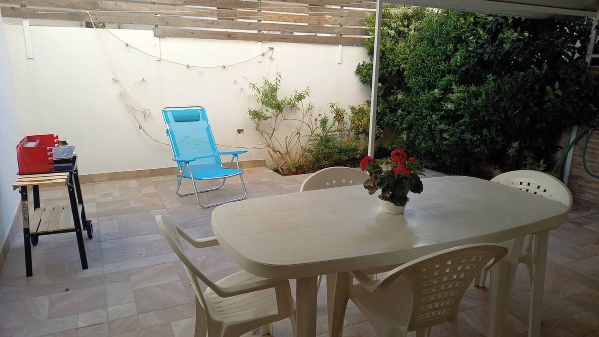 Lido Conchiglie Apartment | Apartment 'Blu' with Private Terrace, Private Garden and Air Conditioning