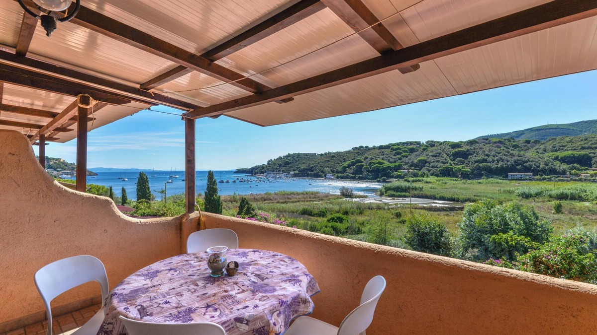 Mola Apartment | Apartment 'Mono4Posti Vista Mare Il Portolano' with Sea View, Wi-Fi and Air Conditioning