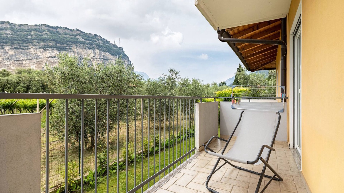 Torbole sul Garda Apartment | Apartment 'N 3 Appartamento Arancio' with Mountain View, Shared Garden and Balcony
