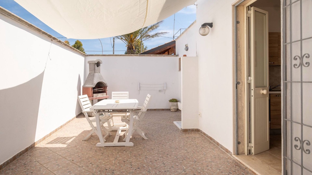 Sant'Isidoro Apartment | Apartment 'Oasi Del Conte' with Private Terrace and Air Conditioning
