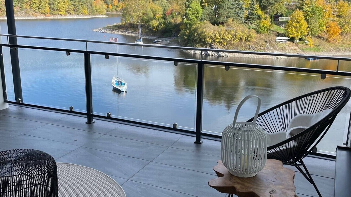 Saaldorf Condo | Apartments- Saaldorf WG 6 with balcony and view of the reservoir