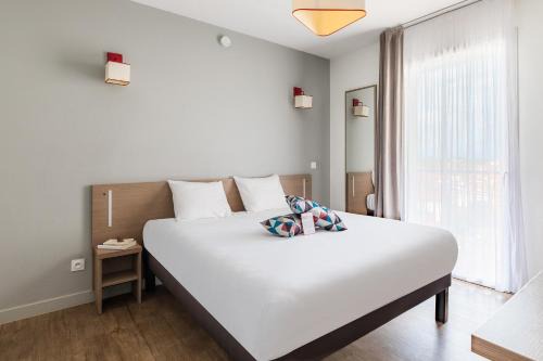 Saint-Assiscle Apartment | Appart'City Confort Perpignan Centre Gare