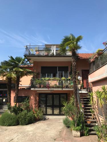 Pero House | Appartamento con terrazza e posto auto Libri e Giardini