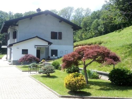 Rueglio Apartment | Appartamento La Casa nel Bosco