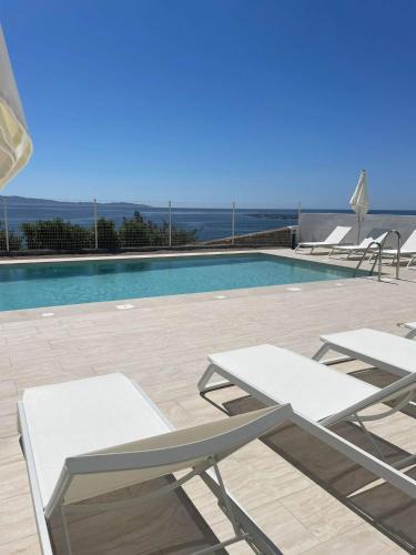 Ajaccio Apartment | Appartement de luxe type 4 Eden Suite Sanguinaires vue mer avec piscine chauffée résidence Ajaccio