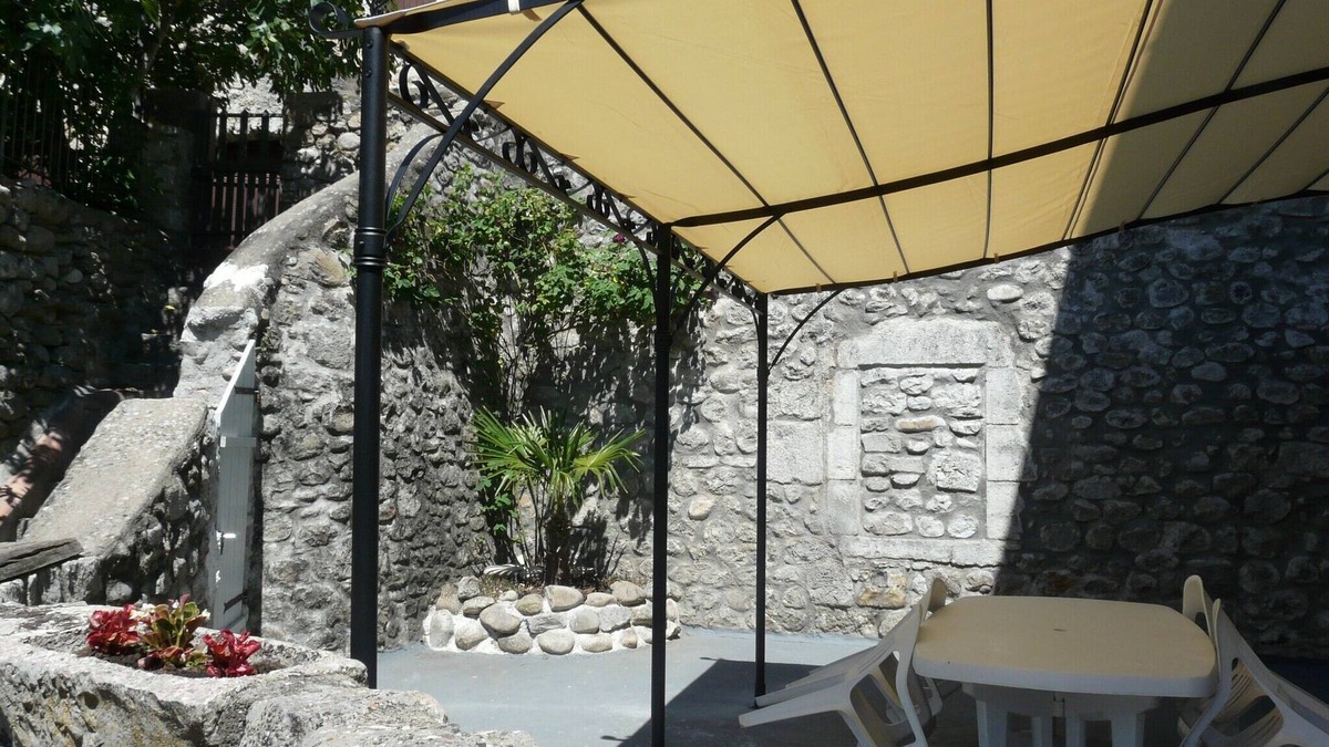 Vogue Apartment | Appt in listed village on river bank, with terrace and barbecue