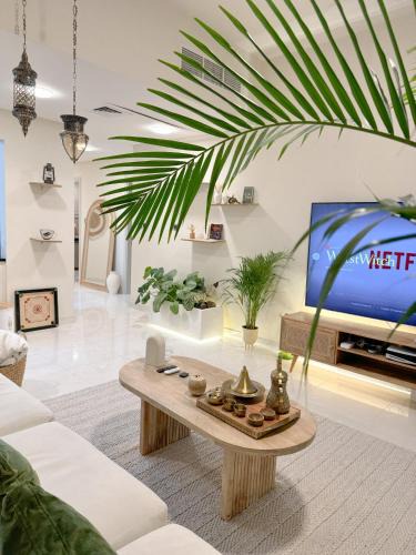 Nad Al Sheba Apartment | Arabian-Inspired 1BR - Polo Residence Near Burj