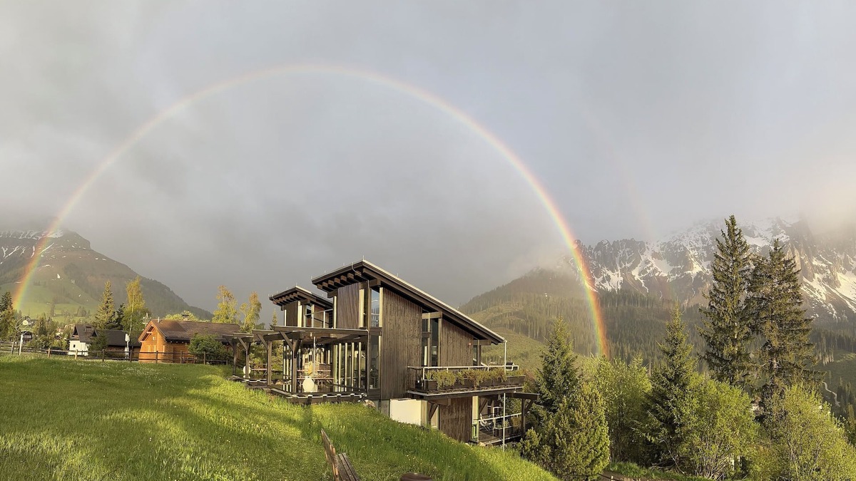 Carezza House | Architect's house Karersee, view of rose garden, Latemar and western Alps